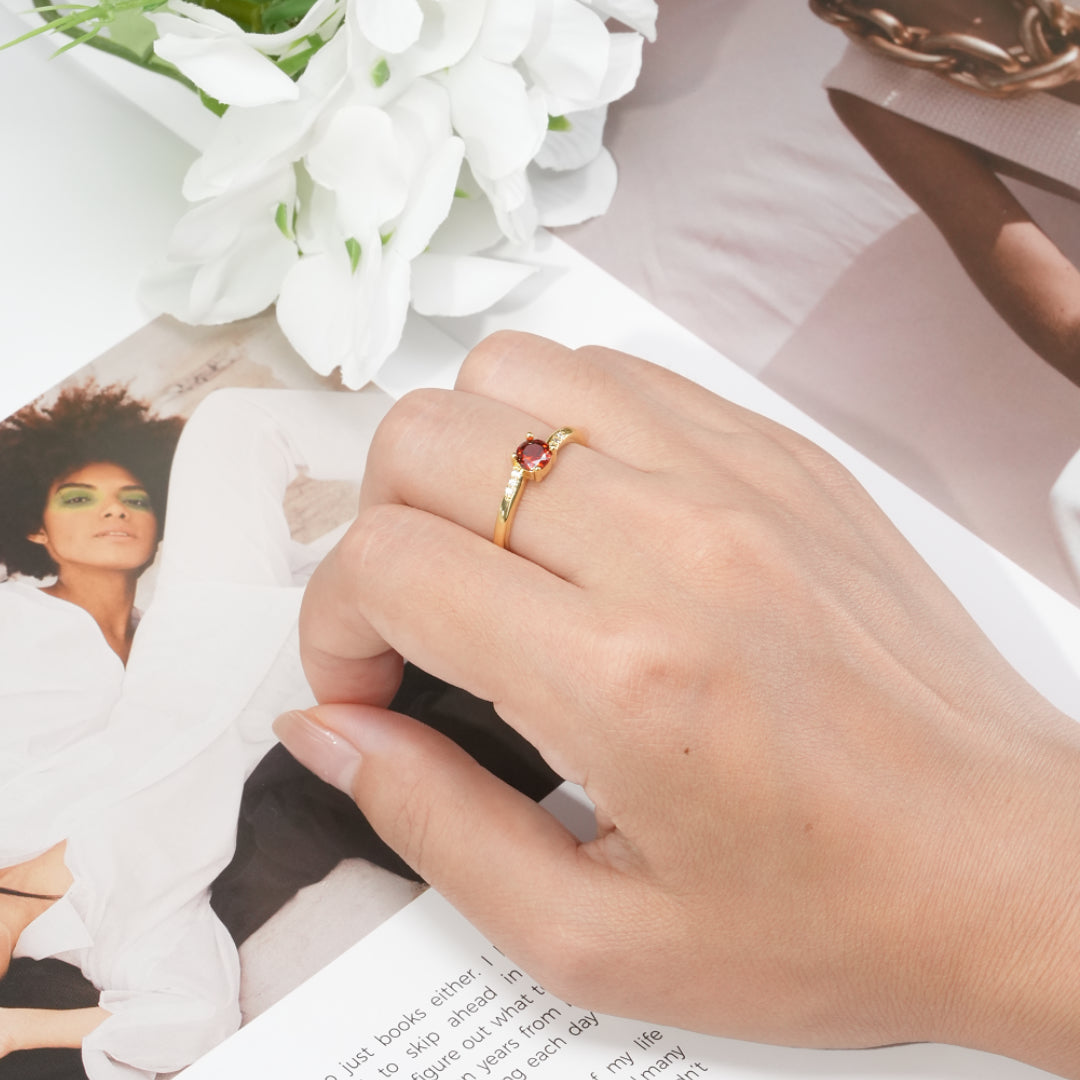 Round Cut Stone Ring with Slightly Twisted Arm Design